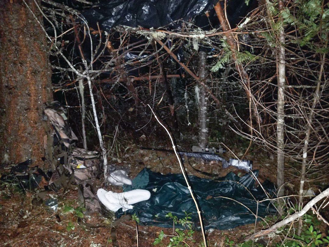 An overnight shelter was fabricated from sticks and two large garbage bags Freeman carries for emergency rain cover. Elk bags were used as pillows.